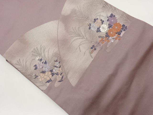 丸に草花模様織出し名古屋帯